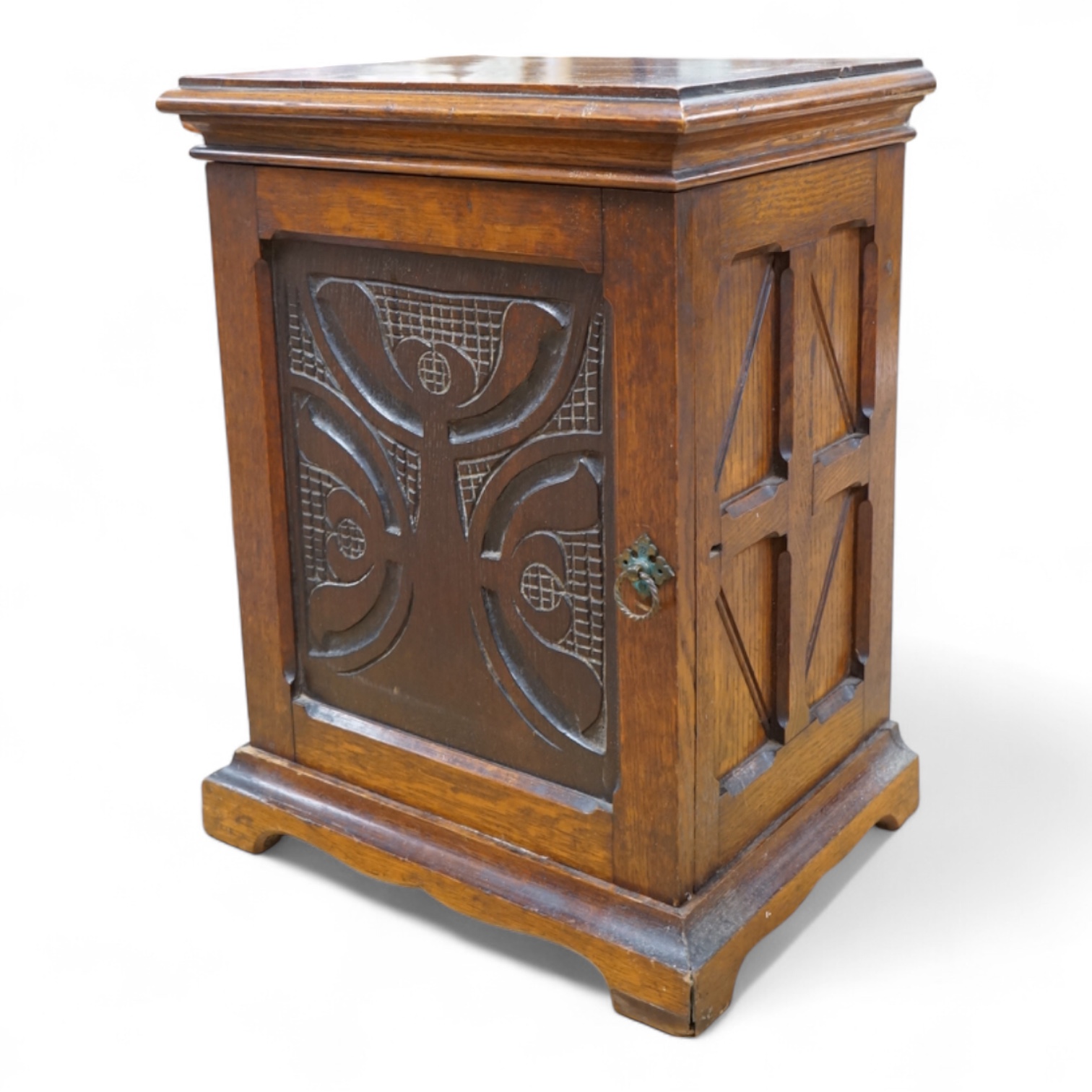 A late Victorian carved oak collector’s cabinet with six drawers, 49cm high